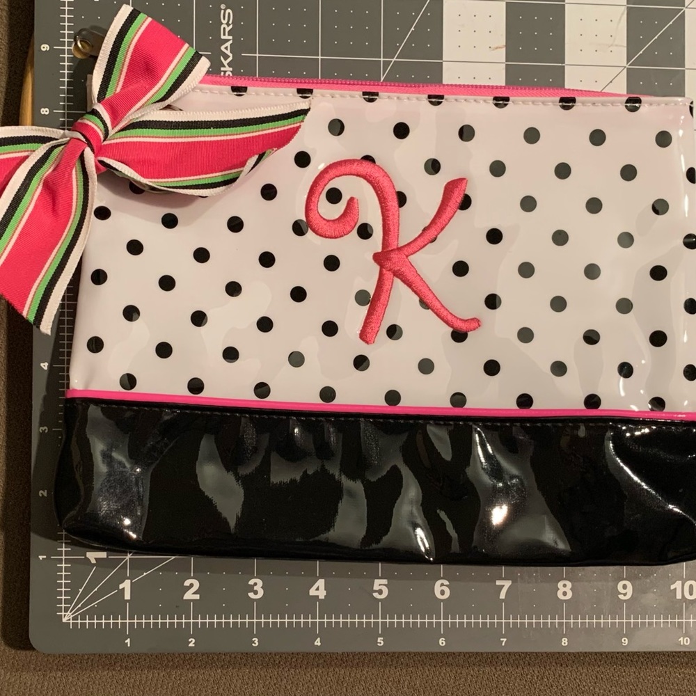 Mudpie Embroidered carry all pouch.